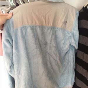 Blue and grey North Face jacket